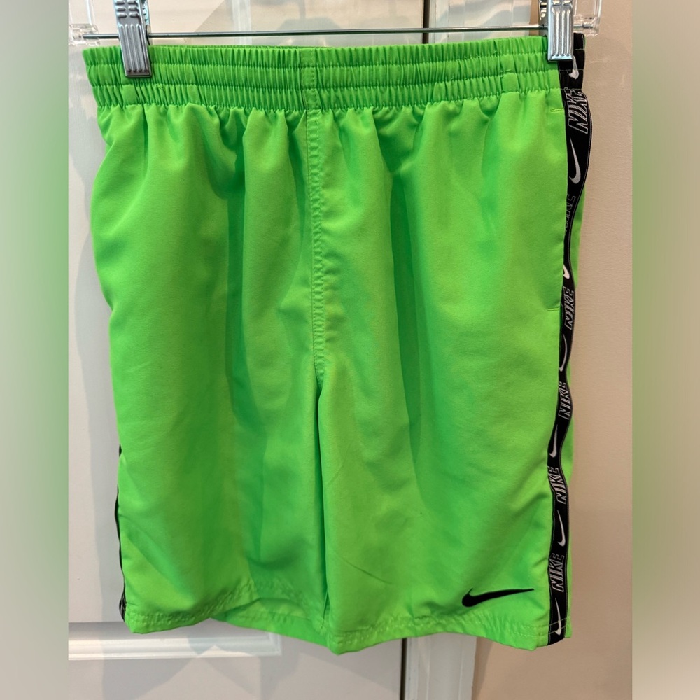 Nike boys youth XL swim suit with front tie, mesh liner and side pockets